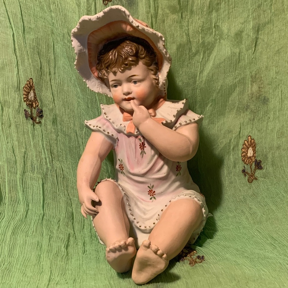 Charming Fine Porcelain Child Figurine in Pink and Cream